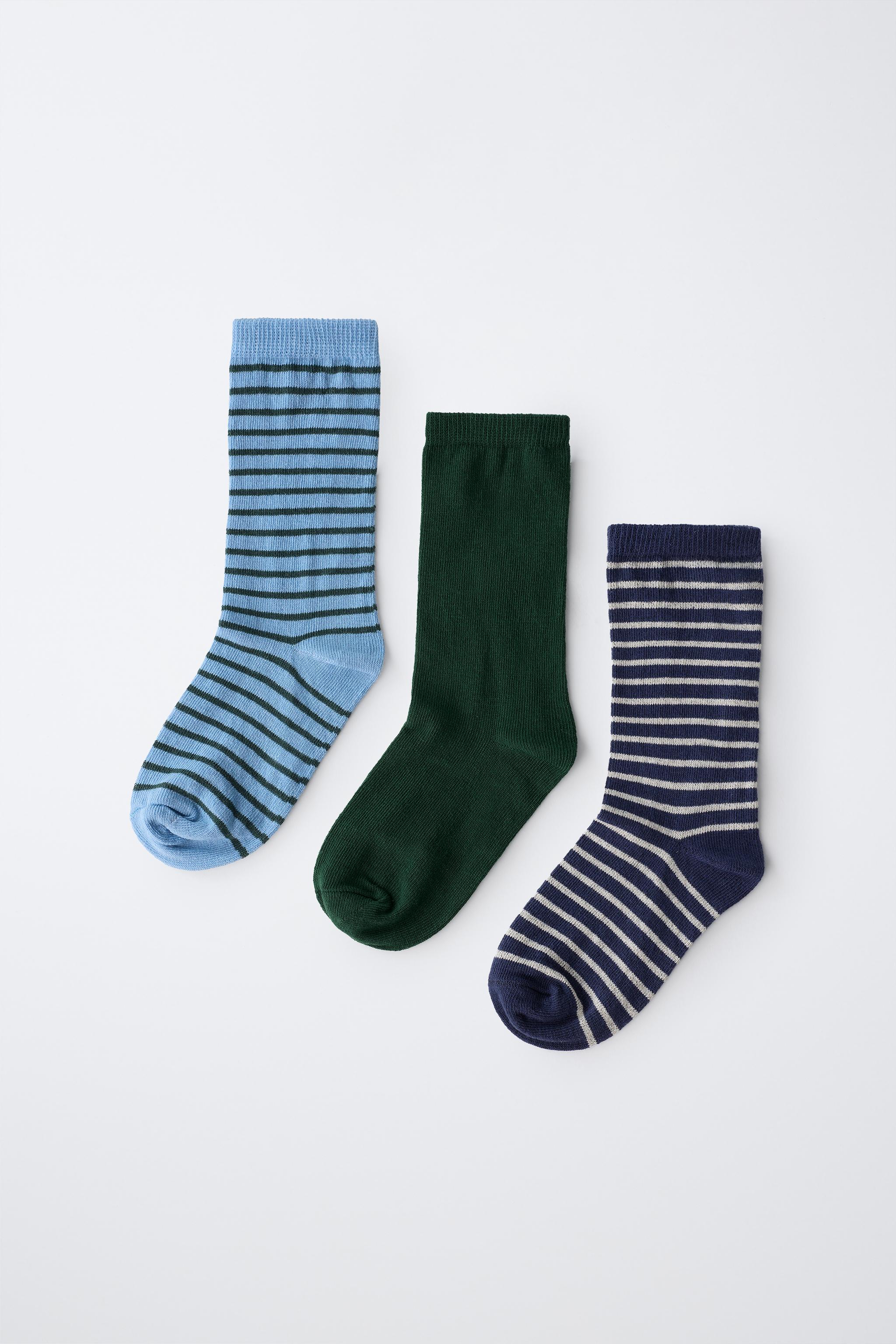 STRIPED AND SOLID MID-CALF SOCKS THREE-PACK